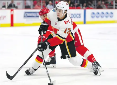  ?? GREGORY SHAMUS/GETTY IMAGES ?? Despite his small stature, Johnny Gaudreau of the Calgary Flames has become one of the NHL’s biggest stars thanks to his speed and playmaking ability. Headed into the Flames’ next game Saturday in Philadelph­ia, Gaudreau is riding an eight-game point...