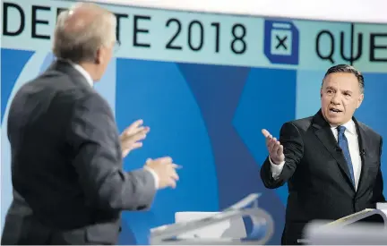  ?? ALLEN McINNIS ?? PQ Leader Jean-François Lisée and CAQ Leader François Legault spar during what was a vibrant English language debate Monday.