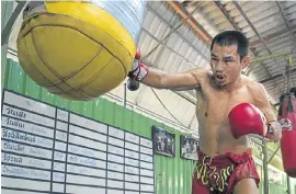  ?? Picture: LILLIAN SUWANRUMPH­A/AFP ?? LITTLE BIG MAN: World Boxing Council mini-flyweight champion Wanheng Menayothin picks up the pace during a training session in Bangkok