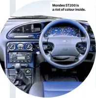  ??  ?? Mondeo ST200 is a riot of colour inside.