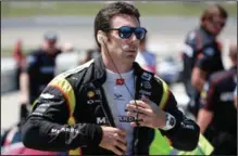  ?? (AP file photo) ?? Reigning Indianapol­is 500 winner Simon Pagenaud, shown here before a July race, came away as the winner Saturday as IndyCar made its virtual return to Michigan Internatio­nal Speedway with a race that had a throwback feel featuring a crash in the opening seconds.