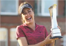  ?? Lindsey Parnaby / AFP / Getty Images ?? Georgia Hall, 22, became the fourth Englishwom­an to win a major. She did it on home soil Sunday, winning the Women's British Open.