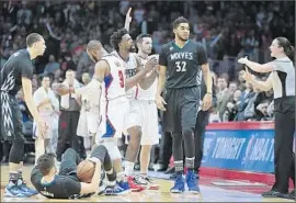  ?? Robert Gauthier
Los Angeles Times ?? AT A KEY MOMENT late in the Clippers’ loss to Minnesota on Wednesday, Chris Paul ( 3, center) is called for a technical foul by referee Lauren Holtkamp.