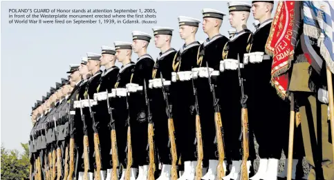  ?? (Reuters) ?? POLAND’S GUARD of Honor stands at attention September 1, 2005, in front of the Westerplat­te monument erected where the first shots of World War II were fired on September 1, 1939, in Gdansk.