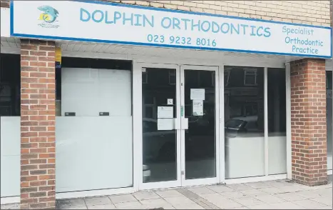  ??  ?? RISK Dolphin Orthodonti­cs, High St, Cosham, where a dentist has been suspended for failing to comply with Covid-19 regulation­s