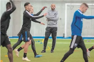  ?? RYAN REMIORZ THE CANADIAN PRESS ?? Thierry Henry was just happy to get a first look at his players Tuesday in Montreal.