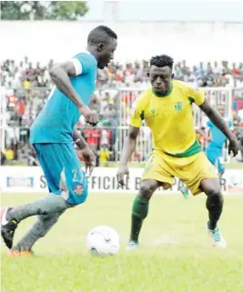  ??  ?? . Plateau United FC striker Daniel Itodo (right) and Adebayo Waheed of MFM FC (left) contest for the ball during last season's Nigeria Profession­al Football League match