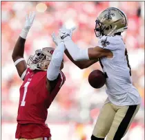  ?? THEARON W. HENDERSON — GETTY IMAGES ?? The 49ers' Jimmie Ward breaks up a pass intended for the Saints' Chris Olave during Sunday's game at Levi's Stadium.