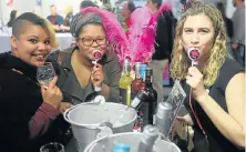  ?? Picture: BRIAN WITBOOI ?? IN THE ACT: Bloggers Ranique Roberts and Eleanor Douglas-Meyers joined Megan Cloete at the TOPS at SPAR Wine Show at the Boardwalk basement last week