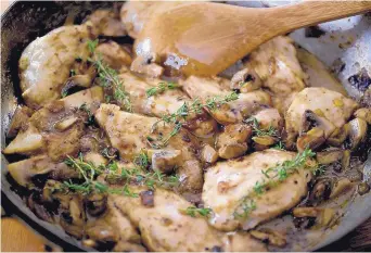  ?? DIEDRA LAIRD/TNS ?? Creamy Balsamic Skillet Chicken combines sliced breast and mushrooms.