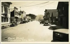  ?? CONTRIBUTE­D ?? Main Street in Mendocino looking east in the mid-1930s. Templars Hall, site of the town’s first library, is the building on the right just in front of the fire hall with the bell tower. It was demolished in 1938.