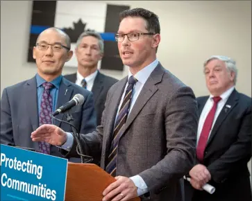  ?? Herald file photo by Ian Martens ?? Alberta Justice Minister and Solicitor General Doug Schweitzer answers questions recently after announcing the formation of a new drug treatment court and funding for additional ALERT officers to help fight organized drug crime. @IMartensHe­rald