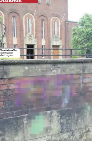  ??  ?? VandalismT­he grafitti upset church-goers