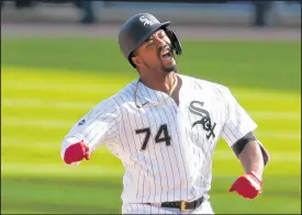  ?? BRIAN CASSELLA/CHICAGO TRIBUNE ?? White Sox left fielder Eloy Jimenez celebrates his RBI double to take a 4-3 lead on the Twins in the seventh inning Thursday.