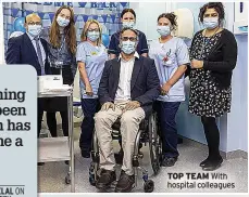  ?? ?? TOP TEAM With hospital colleagues