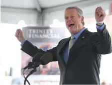  ?? Nancy lane pHotos / Herald staFF ?? GETTING EXCITED: Gov. Charlie Baker announces a new round of state affordable housing assistance in Lawrence, where work to convert mill space into 87 housing units will receive some of the funding.