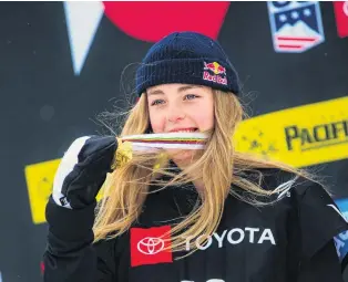  ?? PHOTO: GETTY IMAGES ?? Golden glow . . . Wanaka’s Zoi Sadowski Synnott celebrates with her medal after winning gold in the women’s snowboard slopestyle at the world skiing/snowboardi­ng championsh­ips in Utah yesterday.