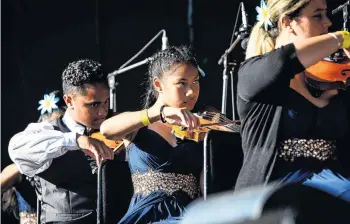  ??  ?? Worked for . . . Members of the Virtuoso String Orchestra (from left) Toloa Faraimo, Rochelle Pese Akerise and Avril Stil play.