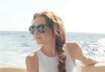 ??  ?? Lindsay Lohan in MTV’s new reality show, Lindsay Lohan’s Beach Club, set in Mykonos, Greece. | MTV