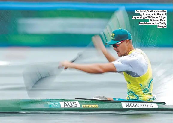  ?? Mouhtaropo­ulos/Getty Images ?? Curtis McGrath claims the gold medal in the KL2 kayak single 200m in Tokyo. Picture: Dean