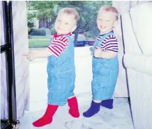  ??  ?? Nolan, left, and Tyrone, photograph­ed on their first birthday, were born on the eve of Mother’s Day 21 years ago.