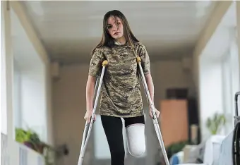  ?? LIBKOS THE ASSOCIATED PRESS ?? Ruslana Danylkina, 19, a Ukrainian soldier who lost her leg in the fighting near Kherson, in a city hospital in Odesa, Ukraine.