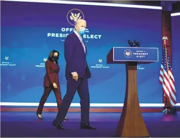  ?? MARK MAKELA GETTY IMAGES ?? President-elect Joe Biden and Vice President-elect Kamala Harris prepare to introduce key foreign policy and national security nominees and appointmen­ts last week at the Queen Theatre in Wilmington, Del.