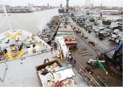  ??  ?? General view of the Galloo ship recycling plant in Ghent from a French seismic vessel February 25, 2015. The European Union plans to impose strict new rules on how companies scrap old tankers and cruise liners, run aground and dismantled on beaches in...