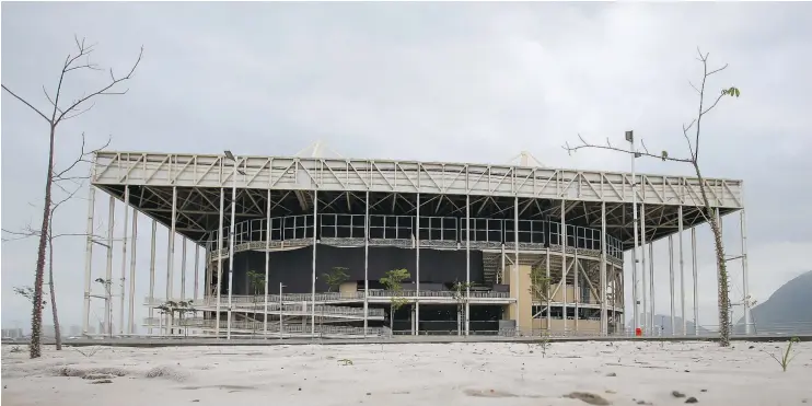  ?? — GETTY IMAGES ?? Nine months after the 2016 Rio Games, the Olympic Aquatics stadium has yet to be dismantled as planned, so its parts can be used to build two new facilities.