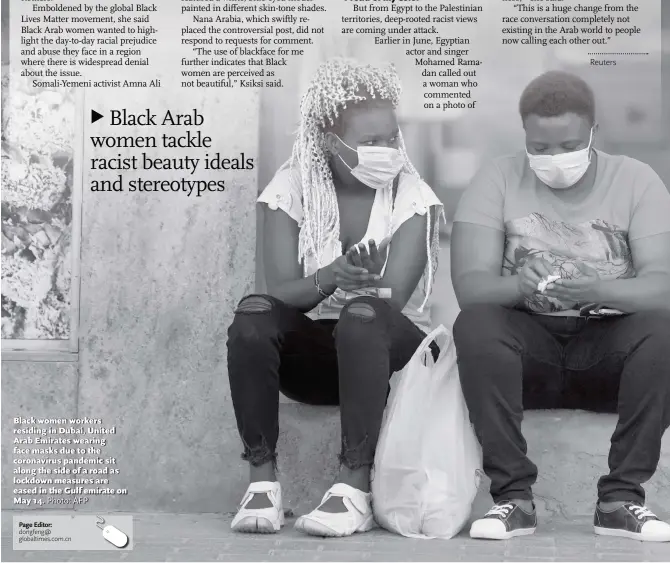  ?? Photo: AFP ?? Black women workers residing in Dubai, United Arab Emirates wearing face masks due to the coronaviru­s pandemic sit along the side of a road as lockdown measures are eased in the Gulf emirate on May 14.