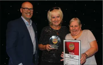  ??  ?? Senior award winners Marlene Johnston, left and Marie McMonigle with Evening Times editor Donald Martin