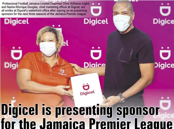  ??  ?? Profession­al Football Jamaica Limited Chairman Chris Williams (right) and Nasha-monique Douglas, chief marketing officer at Digicel, are all smiles at Digicel’s waterfront office after signing on as presenting sponsors for the next three seasons of the Jamaica Premier League.