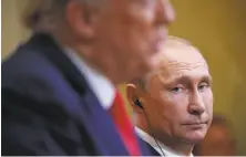  ?? Pablo Martinez Monsivais / Associated Press ?? Some Americans are glad that Russian President Vladimir Putin may have helped get President Trump get elected.