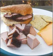  ?? NWA Democrat-Gazette/FLIP PUTTHOFF ?? Chunks of smoked bologna make a fine snack treat, or a sandwich of sliced smoked bologna is haute cuisine indeed. A bird-watching trip in Oklahoma led to finding the delicacy at a country store, but it’s easy to make your own smoked bologna at home.