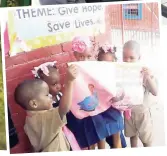  ??  ?? Students at the St Joseph’s Infant School, Kingston celebrate Pink Day with The Gleaner in support of Breast Cancer Awareness Month