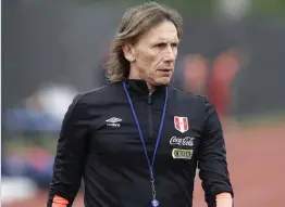  ??  ?? Peru’s national soccer team coach Ricardo Gareca, of Argentina, is without any previous experience coaching a national team. Gareca led Peru to the World Cup finals for the first time in 36 years. Photo: AP