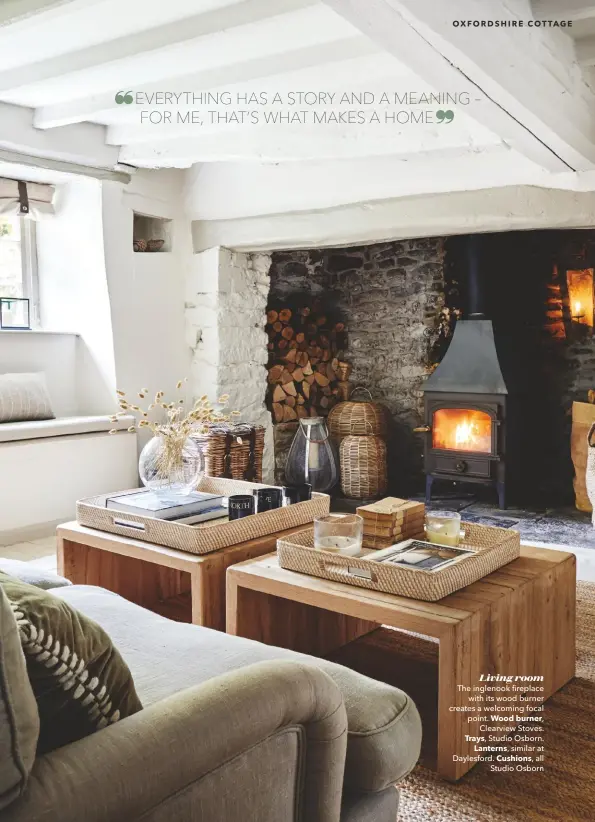  ??  ?? Living room The inglenook fireplace with its wood burner creates a welcoming focal point. Wood burner,
Clearview Stoves. Trays, Studio Osborn. Lanterns, similar at Daylesford. Cushions, all Studio Osborn