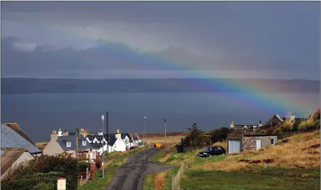  ??  ?? „ There could be gold at the end of that rainbow for the people of Lewis if a bid to supply the National Grid from their own wind turbines is successful.