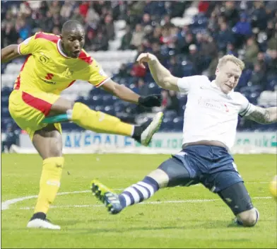  ??  ?? NOT AFRIAD TO SHOOT: MK Dons striker Benik Afobe has a shot on goal