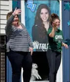  ?? Matt Freed/Post-Gazette ?? Bonnie Montalbano and her daughter, Maddie, 17, a senior at Seneca Valley High School, wave to teachers from Haine Elementary, Rowan Elementary and Haine Middle School as they parade through neighborho­ods on April 27 in Cranberry.