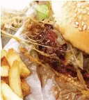  ?? PICTURE: ZOMATO ?? MEATY MOUTHFUL: Sink your teeth into this bad boy at Woodies.