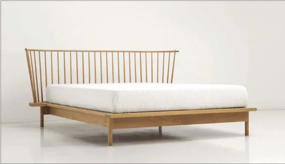  ??  ?? One way to conserve space is by not selecting a bed with a bulky frame and headboard. (Thomas Moser)