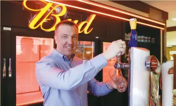  ?? (Maxim Shemetov/Reuters) ?? DMITRY SHPAKOV, the head of AB InBev’s Russian business, poses during an interview with Reuters in Moscow last month. Last year, AB InBev saw double-digit growth in Russian sales of its alcohol-free beers, and it expects to achieve a similar pace this...