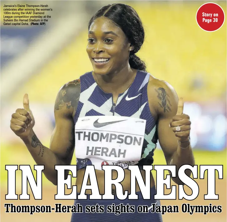  ?? (Photo: AFP) ?? Jamaica’s Elaine Thompson-herah celebrates after winning the women’s 100m during the IAAF Diamond League competitio­n yesterday at the Suheim Bin Hamad Stadium in the Qatari capital Doha.