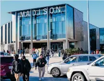  ?? Kirk Sides/Staff photograph­er ?? Students leave the Madison High School campus after school is released. Dozens walked out earlier over a strict cellphone ban.