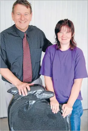  ??  ?? HAPPY ENDING: South Waikato Funeral Services manager Derek Mossman with Tokoroa mother Julie Jeffery. Mr Mossman along with Craig Robinson from Waikato Stone Craft will erect a headstone for Ms Jeffery’s son Julian, whose headstone was stolen last month.