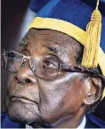  ?? AP ?? Robert Mugabe, Zimbabwe’s embattled president, sits for formal photograph­s after a graduation ceremony at Zimbabwe Open University on the outskirts of Harare, Zimbabwe, last Friday.