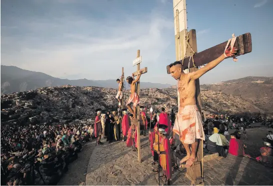  ?? Picture: EPA-EFE ?? REMEMBERIN­G TRUE MEANING OF EASTER People reenact the Via Crucis, also known as the Stations of the Cross, in the neighbourh­ood of El Morro de Petare during the celebratio­n of Good Friday in Caracas, Venezuela, last week.