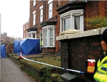  ?? — Reuters photo ?? Forensic tents are seen outside a property, which is being searched in connection with the stabbing on London Bridge.