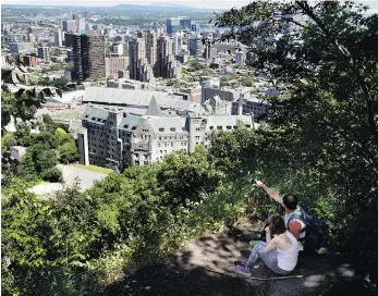  ??  ?? The second lookout peers over Molson Stadium, the Jacques Cartier Bridge and the Biosphere on Île Sainte-Hélène.